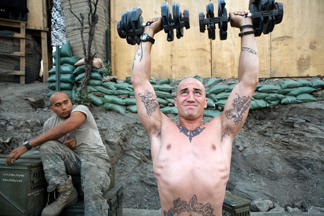 Stichter lifts weights at the Restrepo outpost.